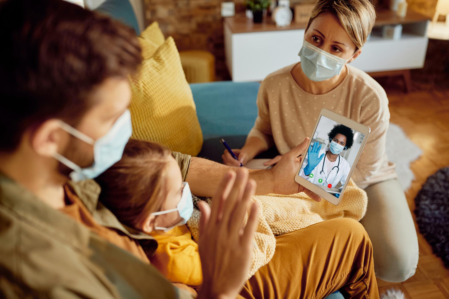 Family using the Ratna HealthPlex mobile health app with their doctor on a smartphone